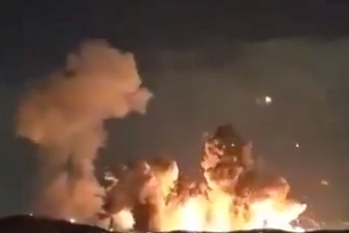 A massive explosion at an Iranian ammunition depot after bunker buster bombs ripped through the facility, causing widespread destruction and raising concerns about the escalating tensions in the region, with smoke and flames billowing into the air