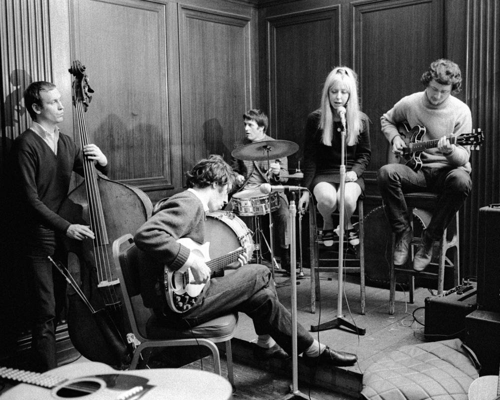 A photograph of Terry Cox, a man with a warm smile and twinkling eyes, whose life's work was a testament to his passion and dedication, inspiring countless individuals with his remarkable story, a true legend in his field