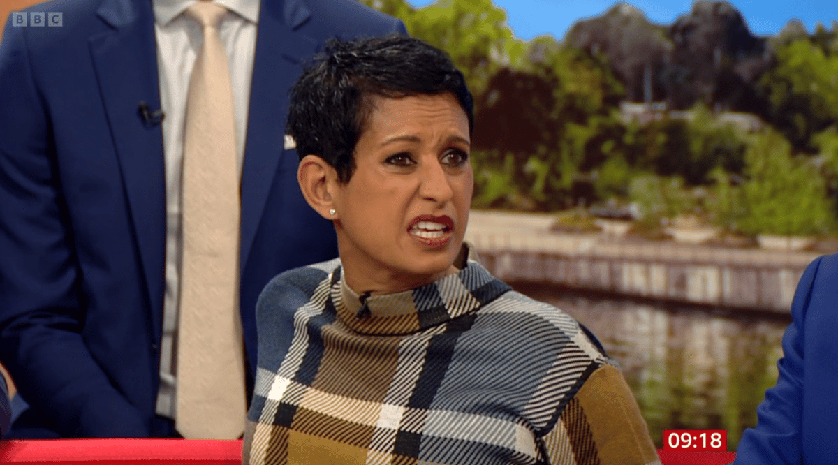 A photo of Naga Munchetty and Carol Kirkwood presenting BBC Breakfast together, with a subtle hint of tension between them, highlighting the drama surrounding their relationship and the programme