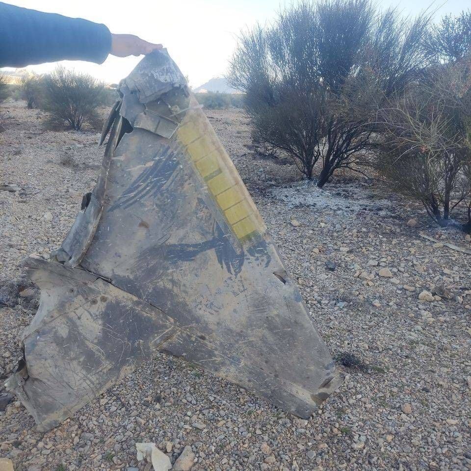 A US fighter jet in flight, with a background of Iranian flags, symbolising the escalating tensions between the two nations, Iran US relations, military conflict