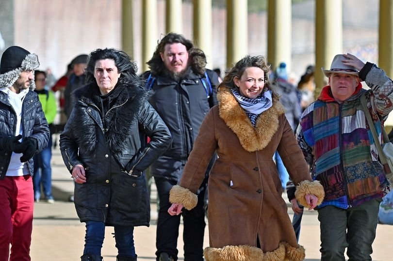 Charlotte Church stands on stage, microphone in hand, ready to inspire the crowd with her message of truth and liberation, a powerful symbol of empowerment and social change