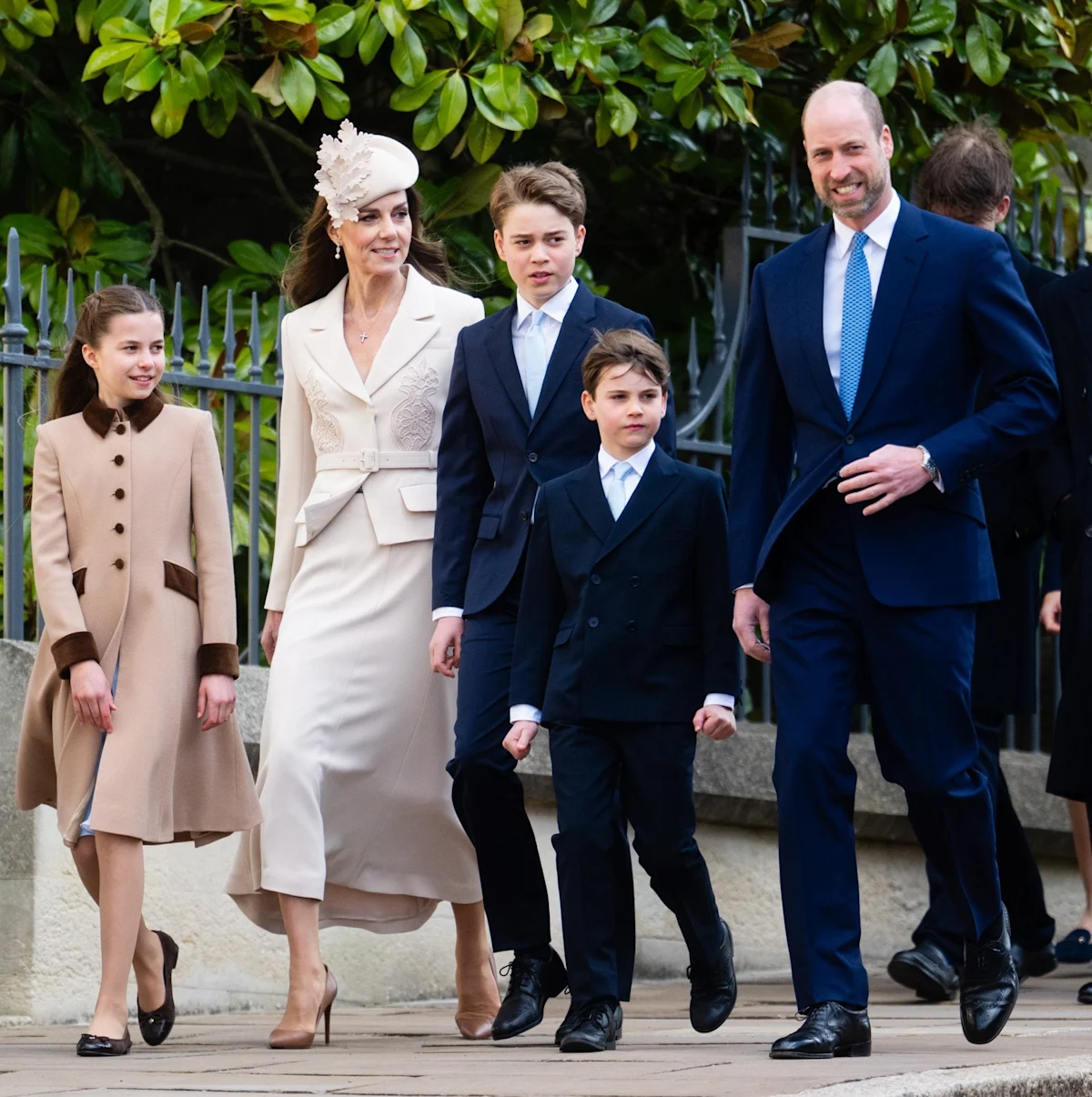 The Royal family gathered outside a church on Easter Sunday, showcasing their modern take on traditional celebrations with a mix of colourful outfits and solemn expressions, highlighting the primary keyword phrase 'Royal family Easter'