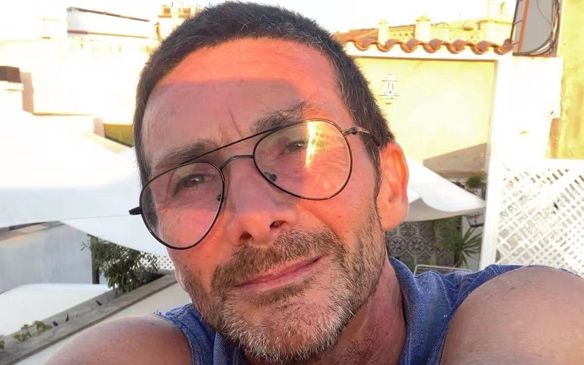 A person trying to stop a shoplifter in a retail store, with a focus on the complexities of shoplifting and employee behaviour, highlighting the importance of supporting staff in preventing retail crime