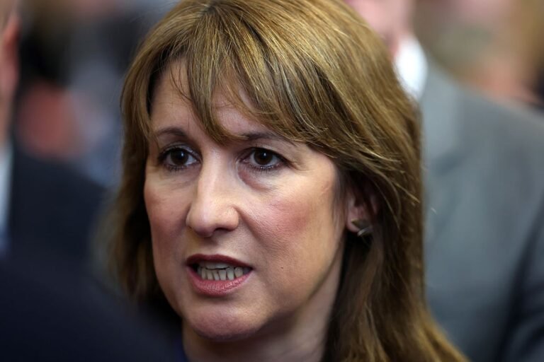 woman holding cash isa statement