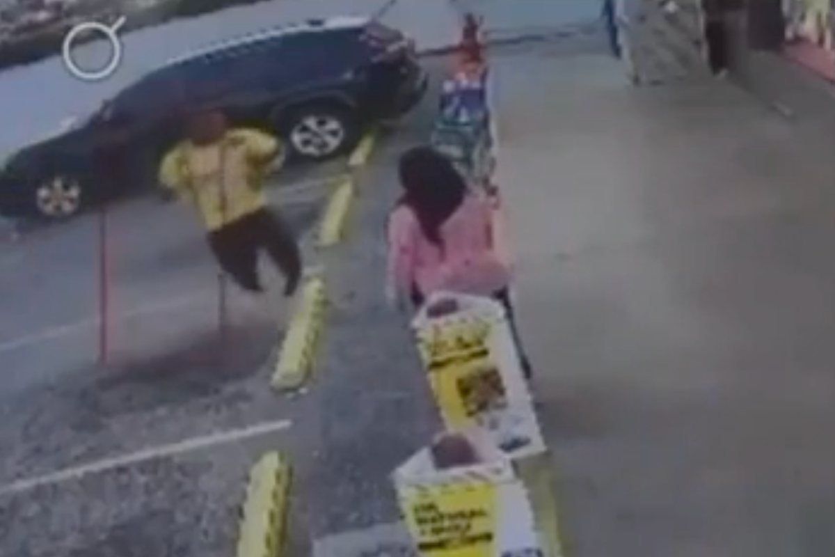 A screenshot of Trump's Truth Social post, featuring a disturbing video of a woman's murder in Florida, with a red flag indicating the removal of the content, and a caption that reads 'Trump's Truth Social meltdown sparks outrage'