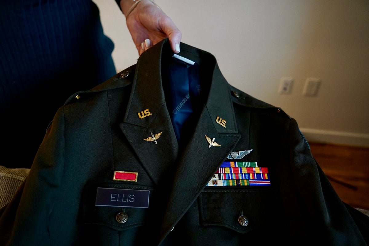 Transgender servicepeople in uniform, with a focus on the challenges they face in the military and the need for greater understanding and acceptance, as they navigate their career progression and overall well-being