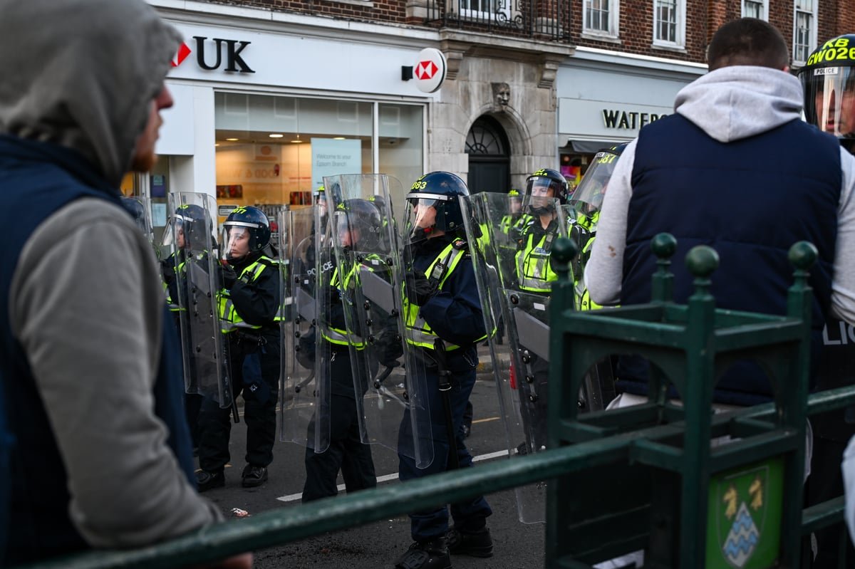 A sombre image of a community coming together to support the victim of the Epsom gang rape, with a focus on promoting safety and preventing violent behaviour