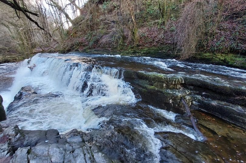 Aerial view of the Welsh beauty spot where the tragic incident occurred, with a stunning landscape and a sense of tranquillity, highlighting the importance of safety awareness in such locations