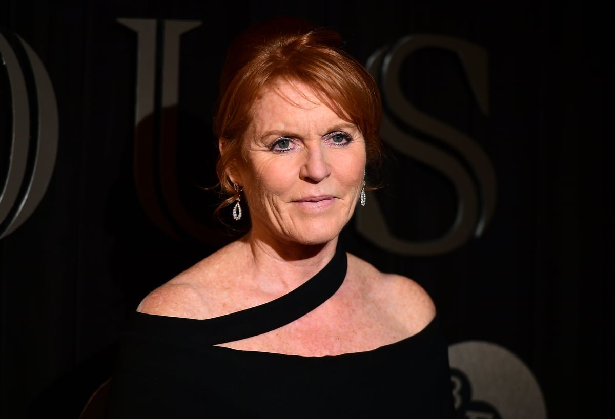 Sarah Ferguson, the Duchess of York, looking concerned and fearful as she contemplates her return to the UK, surrounded by the royal family's complex web of relationships, with a mix of anxiety and uncertainty etched on her face, highlighting her primary concern of being abandoned