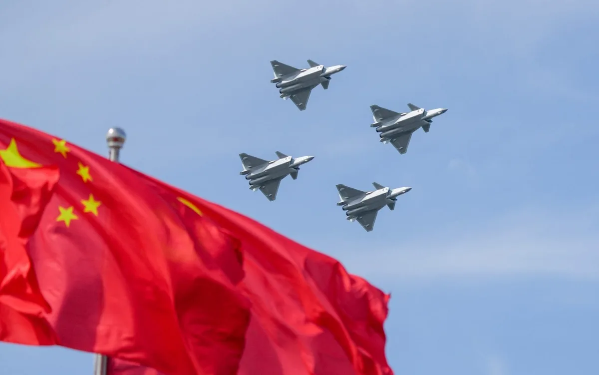 Chinese military aircraft in flight, with a focus on the Primary keyword: airspace restriction, as China imposes a 40-day restriction on its airspace, prompting speculation about the nature and scale of the military activities being undertaken, with a significant impact on regional stability and global security