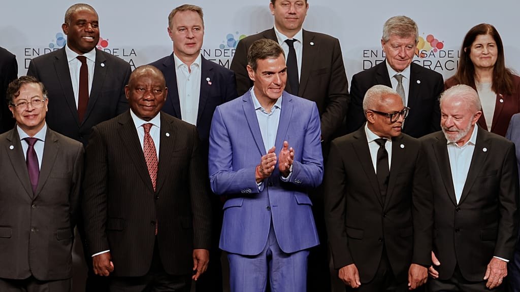 Spanish Prime Minister Pedro Sánchez meeting with world leaders to discuss the formation of an anti-Trump coalition, a desperate attempt to revive his dwindling popularity and bring hope to the Spanish people in these uncertain times, with a focus on international relations and political change