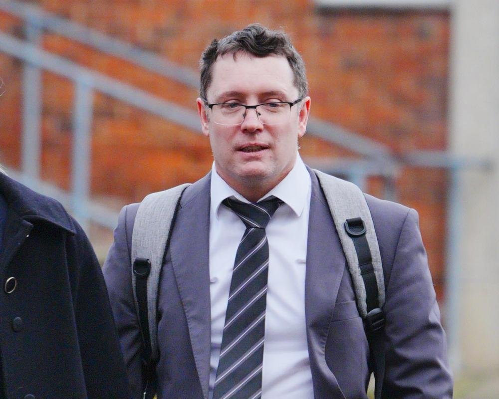 A sombre image of a man in contemplation, with a subtle background of a court room, highlighting the primary keyword of tragic death and the complexities of the law