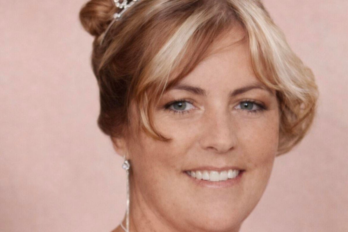 A sombre photo of a family in mourning, with a blurred background of police officers, highlighting the trauma and pain caused by the murder investigation and the need for sensitive policing and victim support