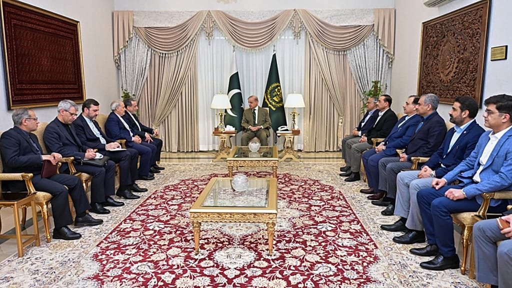 Iranian foreign minister meeting Pakistani officials, discussing regional politics and trade agreements with Russia, led by Putin, in a delicate display of diplomatic behaviour