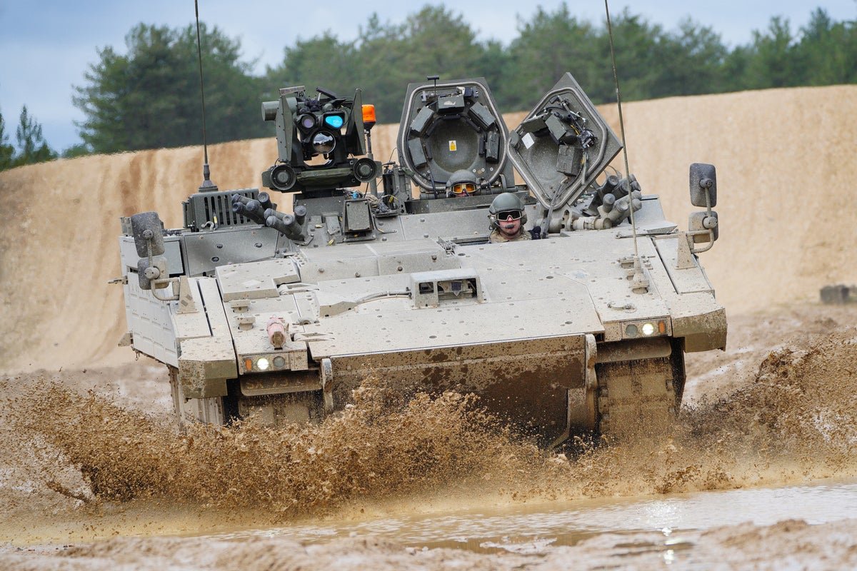 A photo of outdated military equipment, with a soldier in the background, highlighting the need for modernisation and investment in defence technology, with the primary keyword 'military equipment' featured prominently