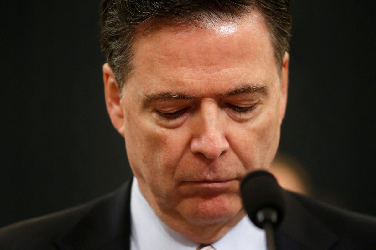 A picture of seashells on a beach, with the former FBI director James Comey at the centre of a controversy over a social media post, highlighting the importance of free speech and the boundaries of power