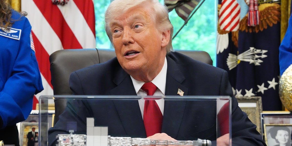 Donald Trump and Vladimir Putin shaking hands, symbolising their controversial alliance amidst the Ukraine war, with a subtle background of the Ukrainian flag, highlighting the complex nature of international relations and the behaviour of world leaders during times of conflict.