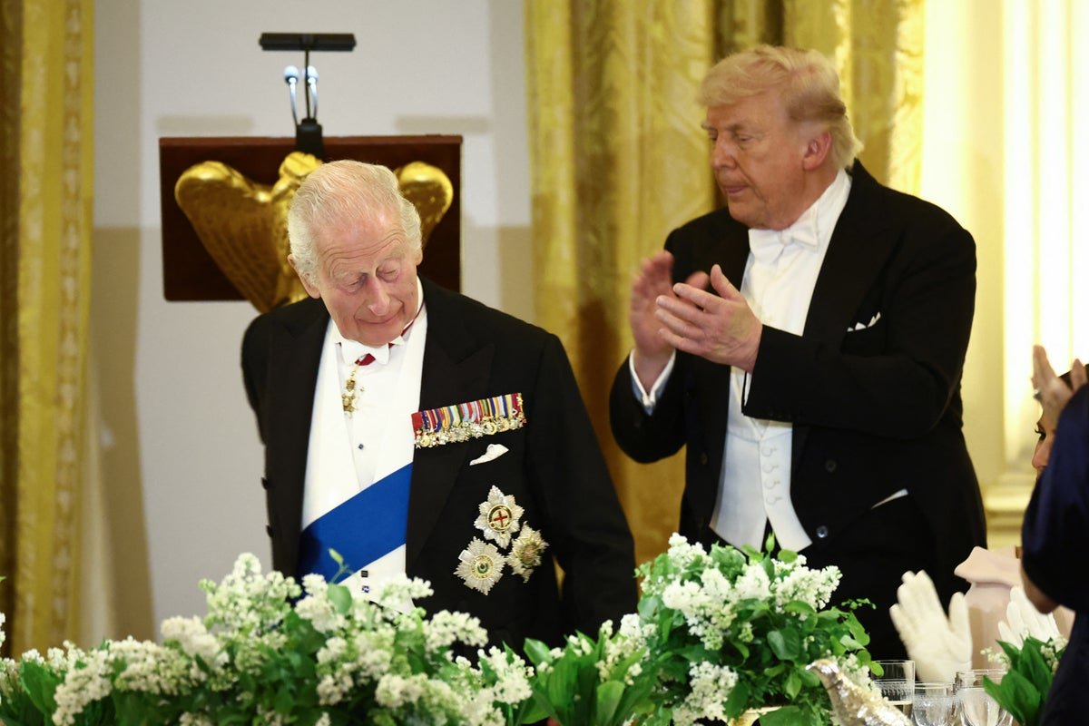 French President Emmanuel Macron responding to King Charles' comment about speaking French, with a cheeky smile and a hint of humour, surrounded by colourful flags and diplomatic officials, highlighting the importance of language skills and cultural awareness in international diplomacy with the primary keyword 'French language'