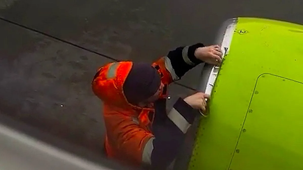 A plane engine covered in tape, sparking concerns about air safety and maintenance standards, with a focus on the primary keyword phrase plane safety