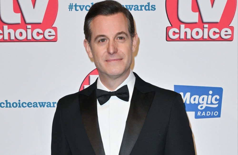 Matt Baker, a Countryfile presenter, stands in a field of green, a sombre expression on his face as he announces the death of a family member, a heartfelt and emotional moment for the BBC star