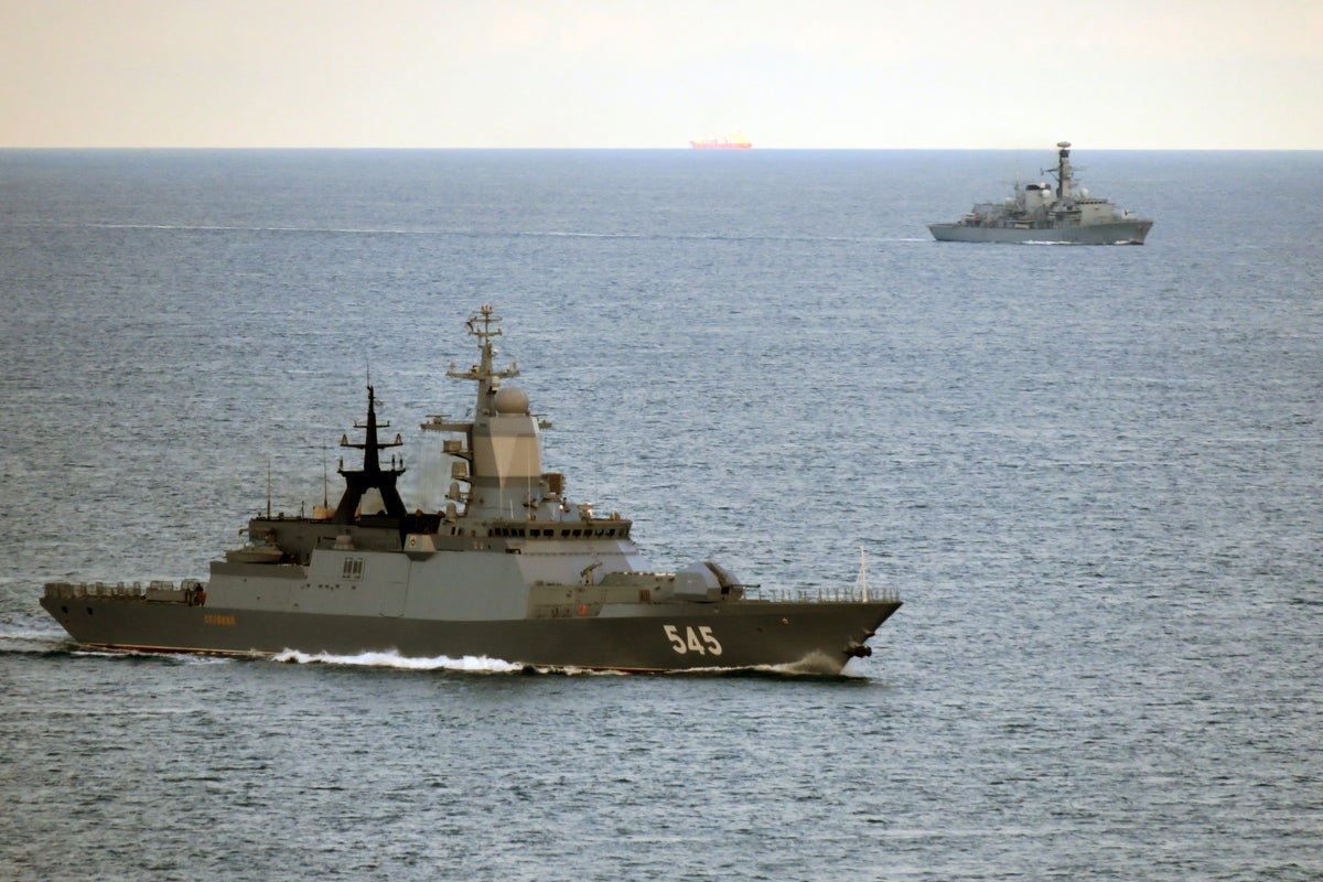 The Royal Navy warship HMS Iron Duke at sea, with its advanced weaponry and technology on display, highlighting the importance of naval capabilities in defending Britain's interests