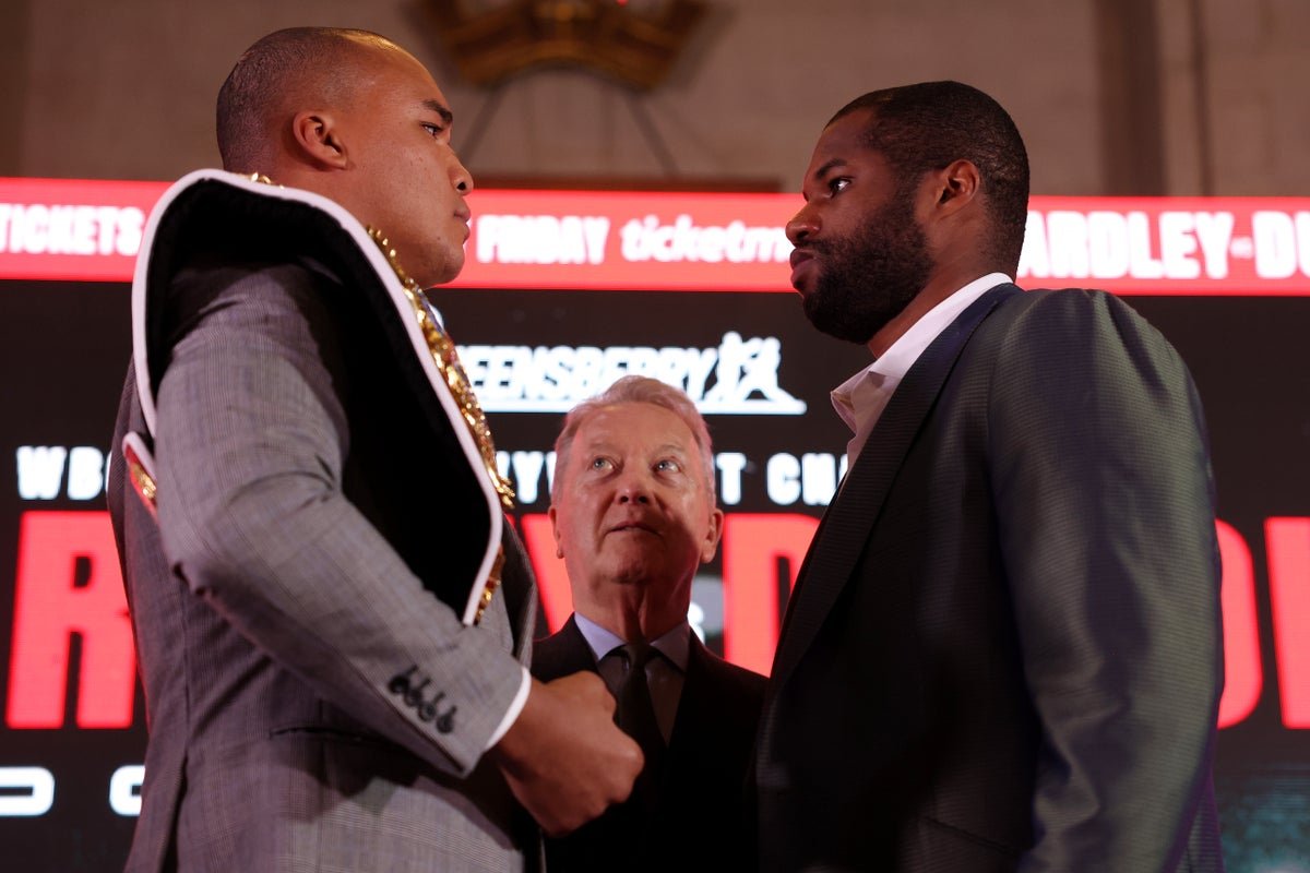 Wardley and Dubois facing off in the ring, with a crowd of fans cheering them on. The atmosphere is electric, with the colour and excitement of the boxing world on full display. The two fighters are ready to put on a show, with their skills and strength on full display. The undercard is equally impressive, featuring a range of talented boxers who are sure to put on a show