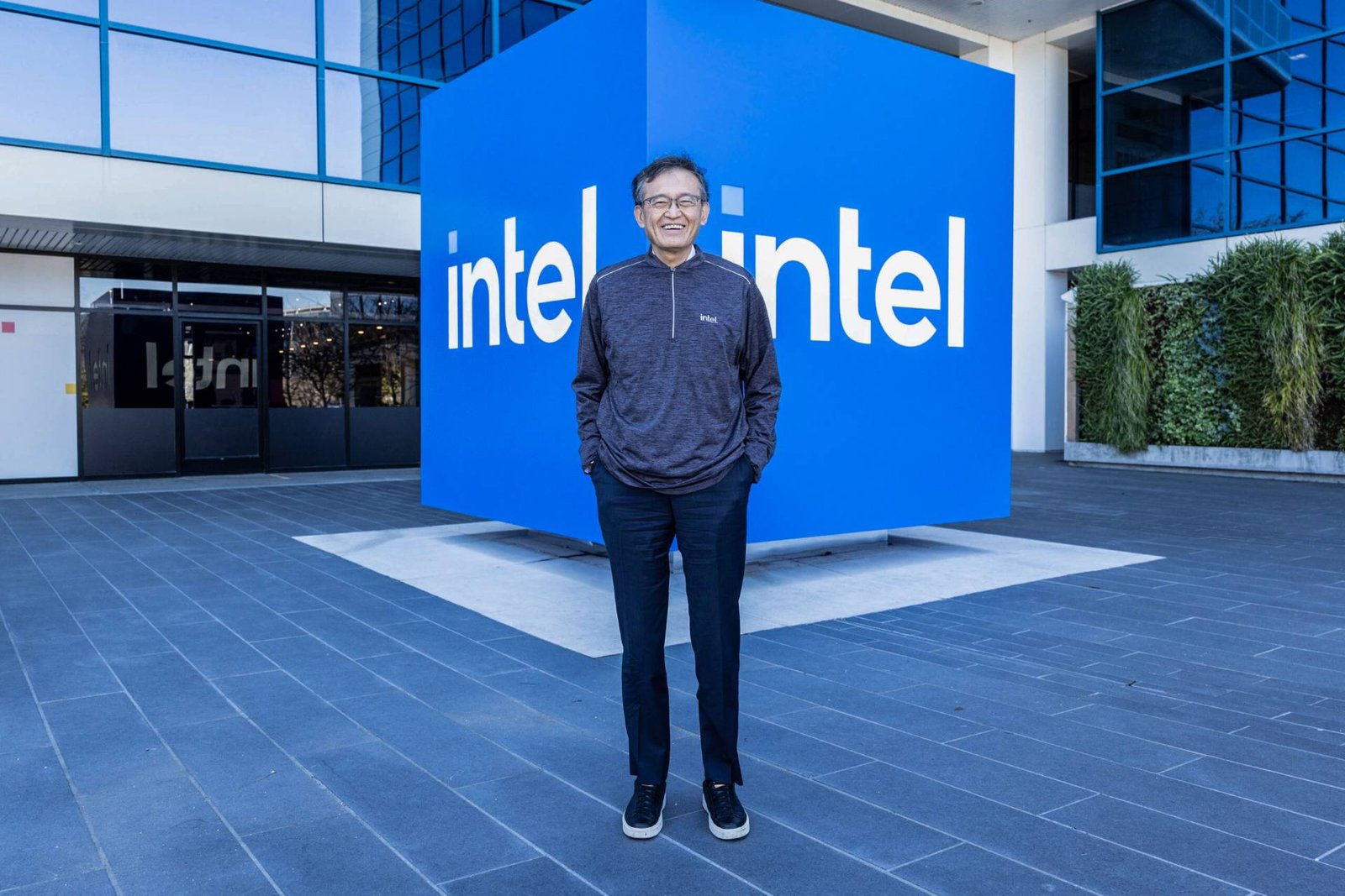 Intel's UK headquarters, a hub of innovation and technology, with a focus on leadership through execution, and a commitment to driving growth and success in the UK tech industry, with a colour palette that reflects the company's dynamic and forward-thinking approach