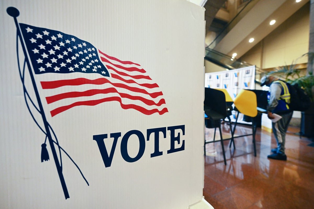 The US flag waving in the wind, symbolising the country's democratic values and the importance of electoral integrity, with the primary keyword phrase 'Election Integrity Army' naturally included in the context of the upcoming midterms