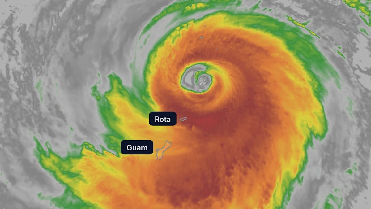 Super Typhoon Sinlaku approaches Saipan, Tinian, and Guam, bringing strong winds and heavy rainfall, with a massive cloud system and powerful gusts, causing widespread destruction and chaos, as the strongest tropical cyclone of 2026