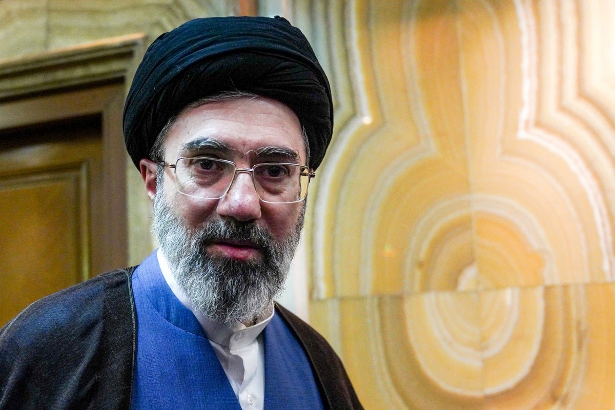 Iran's supreme leader attends a meeting, with a focus on the country's political stability and regional influence, as reports of his injury spark concern and speculation