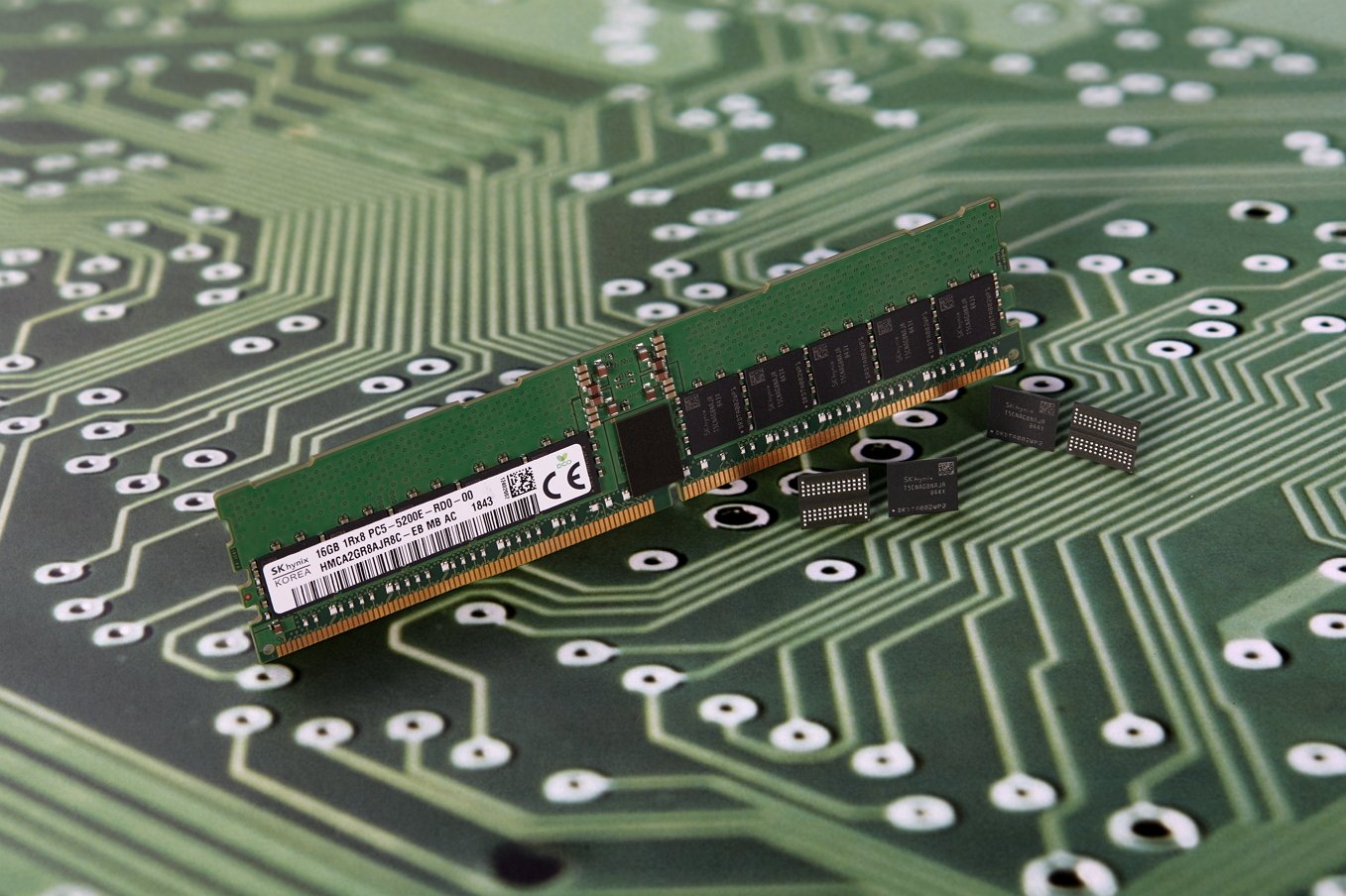 A graph showing the surge in DRAM and NAND prices, with a background image of a UK cityscape, highlighting the impact of the price surge on the UK tech industry, with a focus on SSD and memory prices