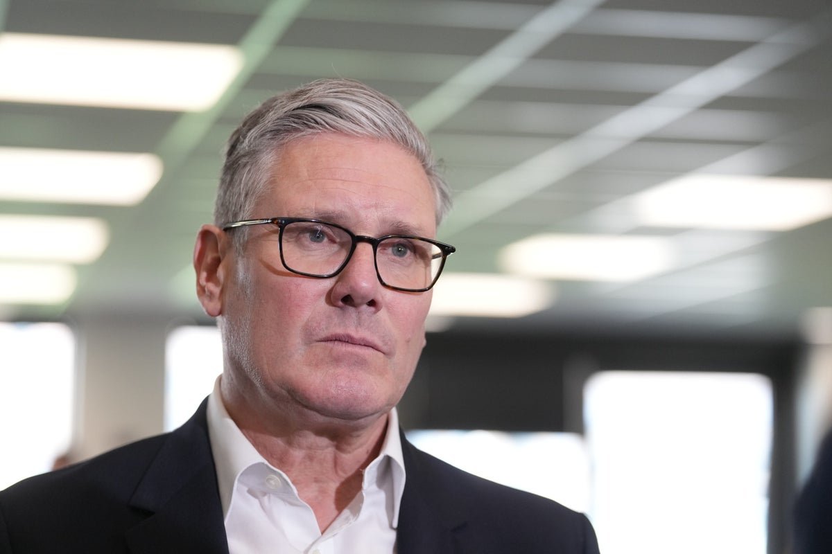 A photograph of Keir Starmer, the leader of the Labour Party, looking concerned as he faces growing demands for his resignation, with a caption that reads 'Labour Party leader Keir Starmer under pressure to quit' and includes the primary keyword 'Labour Party leadership crisis'