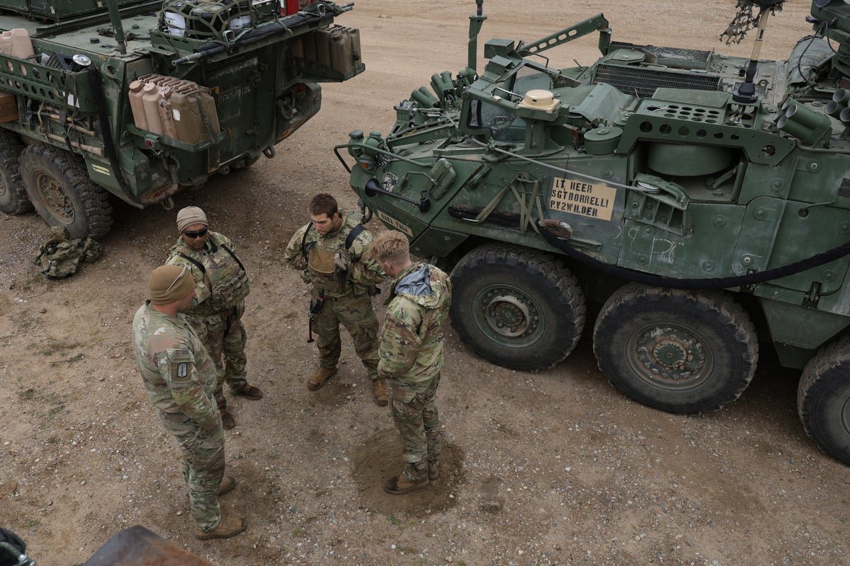 A US military vehicle is seen during a NATO exercise in Poland, the deployment of 4,000 US troops to the country has been cancelled, leaving the future of regional security uncertain, US military strategy, NATO allies, US-Poland relations