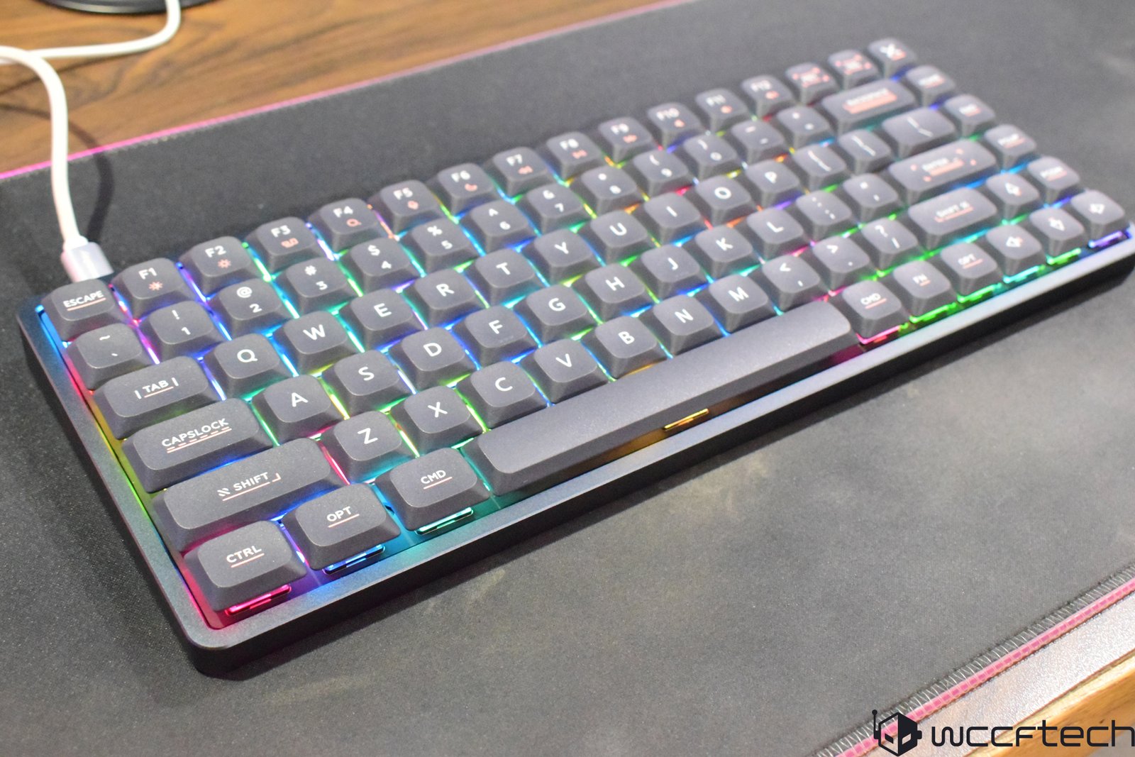 The IQUINIX Magi75 low-profile mechanical keyboard, featuring a compact design and smaller switches, perfect for UK users seeking a fast and silent typing experience, with a sleek and modern colour scheme and design.