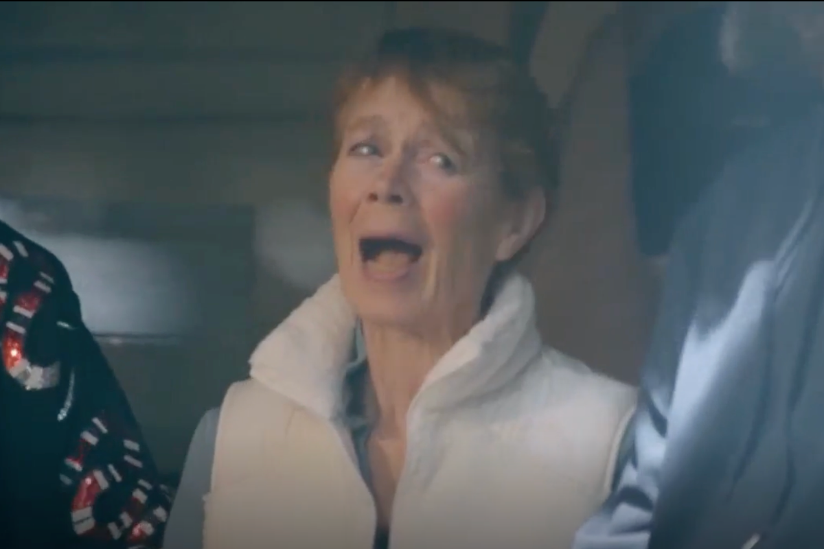 Celia Imrie at the TV Baftas, with a humorous expression on her face, surrounded by other celebrities, with a caption that reads 'the most joked-about moment of the evening'