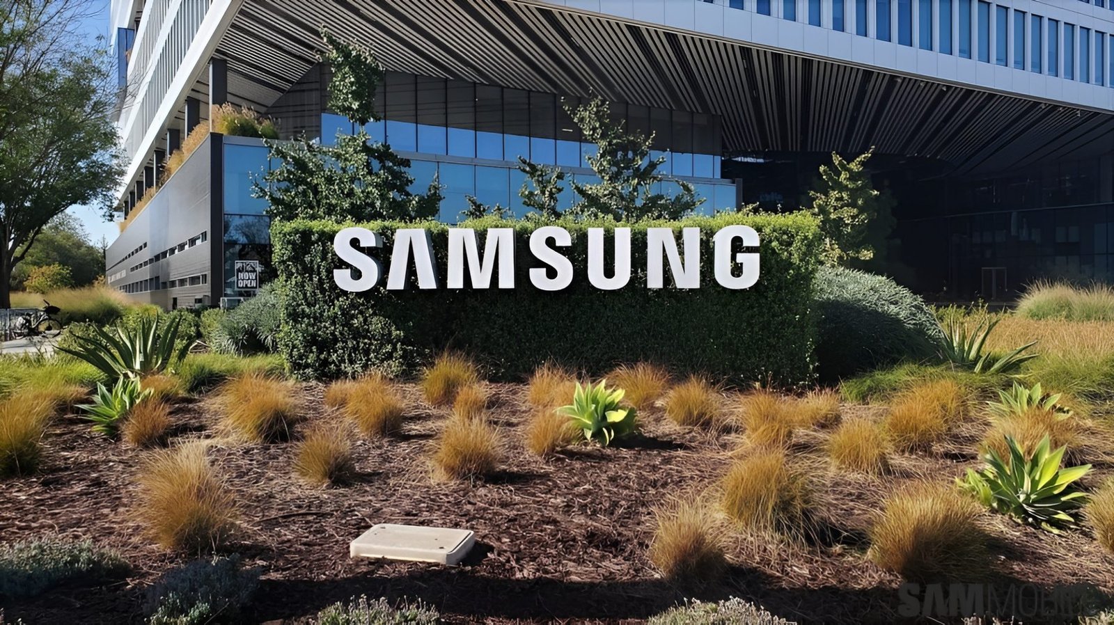 Samsung union workers protesting outside a factory in the UK, with a banner reading 'Fair Pay and Better Working Conditions' in the foreground, highlighting the primary keyword of labour relations in the tech industry