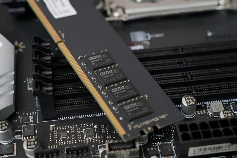 A close-up of a memory chip, with a background of circuit boards and wires, representing the UK tech industry's reliance on efficient and affordable memory chips, with China's investment in the memory market expected to play a significant role in shaping the future of the industry