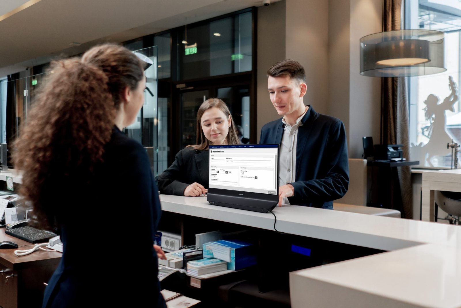 The Philips 24B2D5300 dual-sided business monitor, featuring two 1080p displays, one on each side, perfect for sharing or splitting screens in various UK business scenarios, with a sleek design and advanced features, ideal for companies seeking to upgrade their monitor systems and improve their overall behaviour towards technology adoption