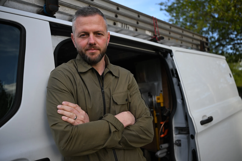 Robert Kenyon, Reform UK's plucky plumber for Makerfield, posing with a plumbing tool, highlighting his unique blend of skills and experience as a plumber and politician