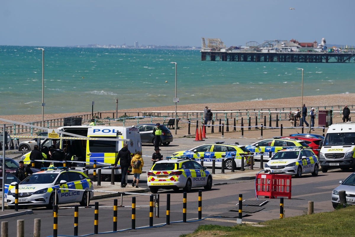 A sombre and reflective image of the sea off Brighton, with a hint of tragedy and loss, featuring a primary keyword, sea tragedy, in a natural and descriptive way, capturing the essence of the incident and its impact on the community.