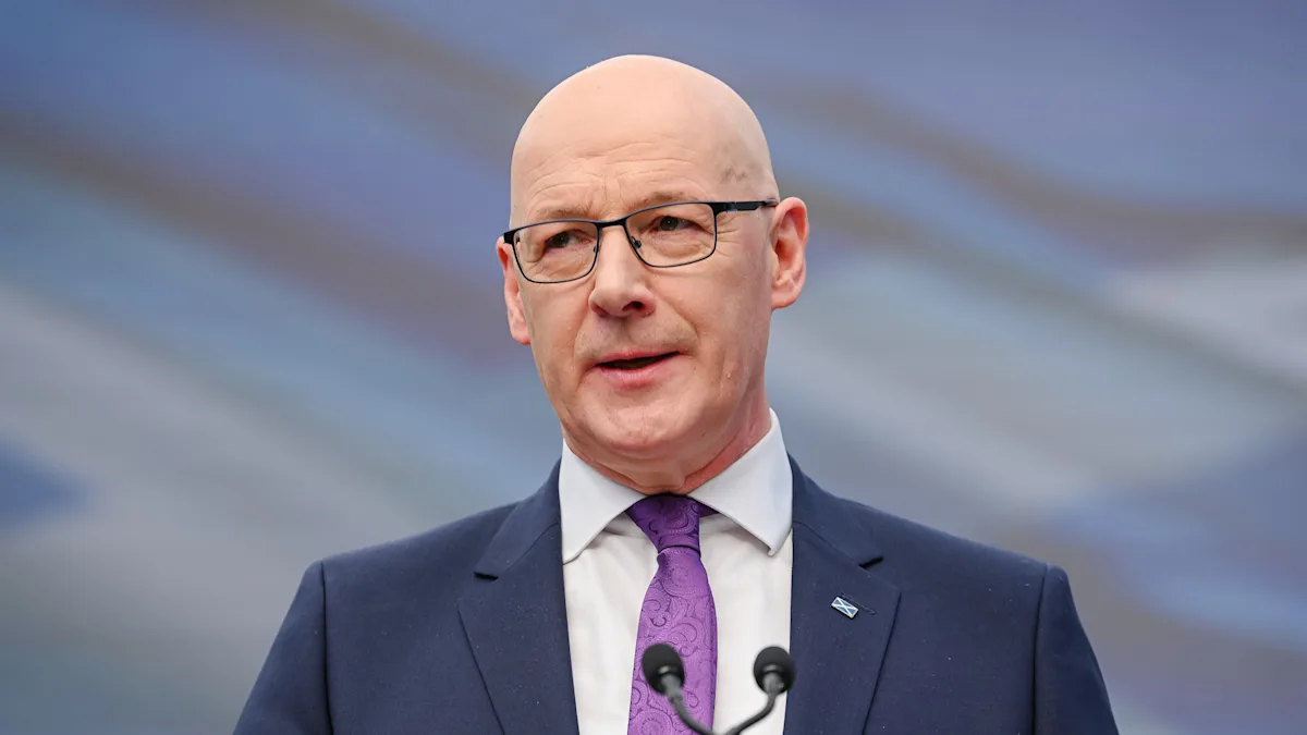 Swinney and Trump in a meeting, with a focus on the declined White House banquet invitation, analysing the behaviour and implications of this significant decision