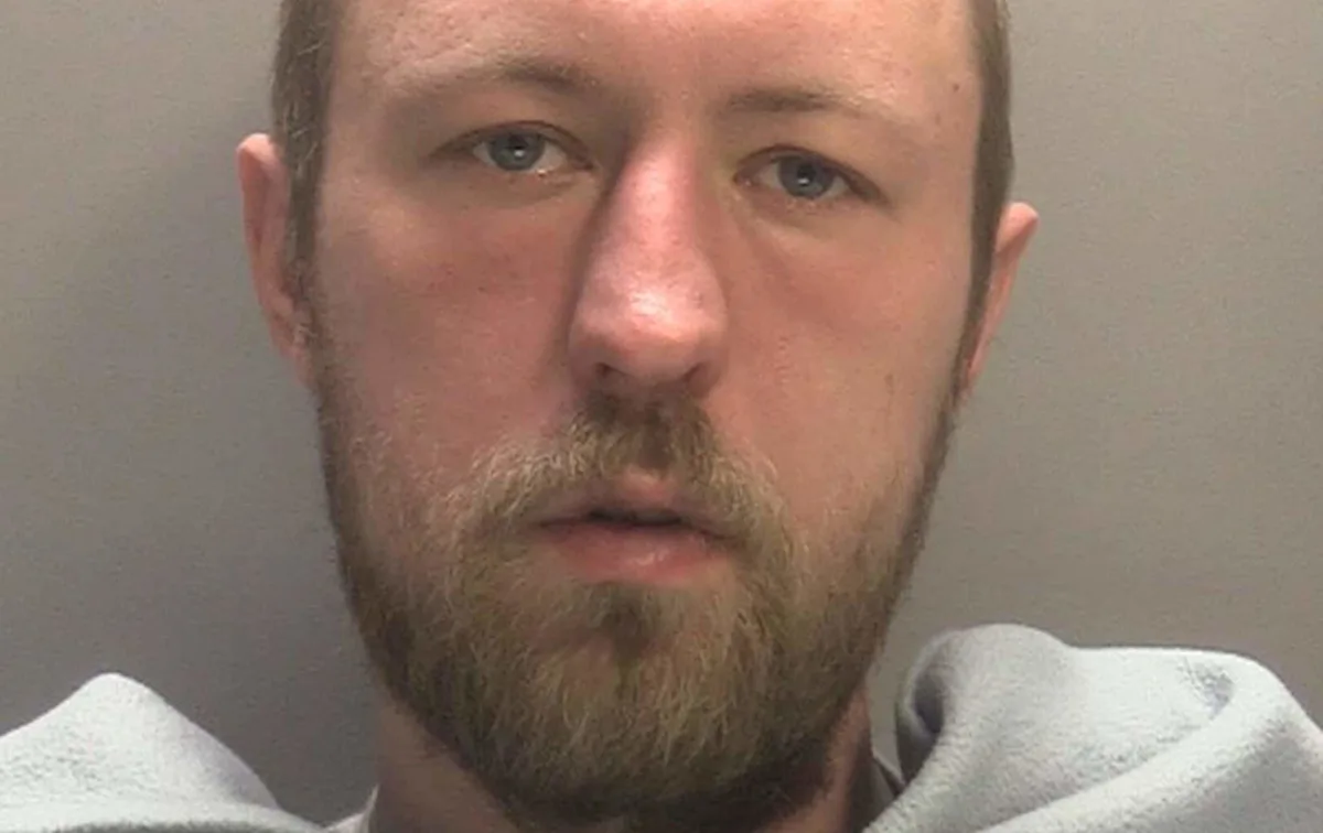 A Sikh woman in a traditional outfit, with a blurred background to protect her identity, highlighting the importance of respecting different cultures and faiths, and promoting tolerance and understanding to prevent hate crimes