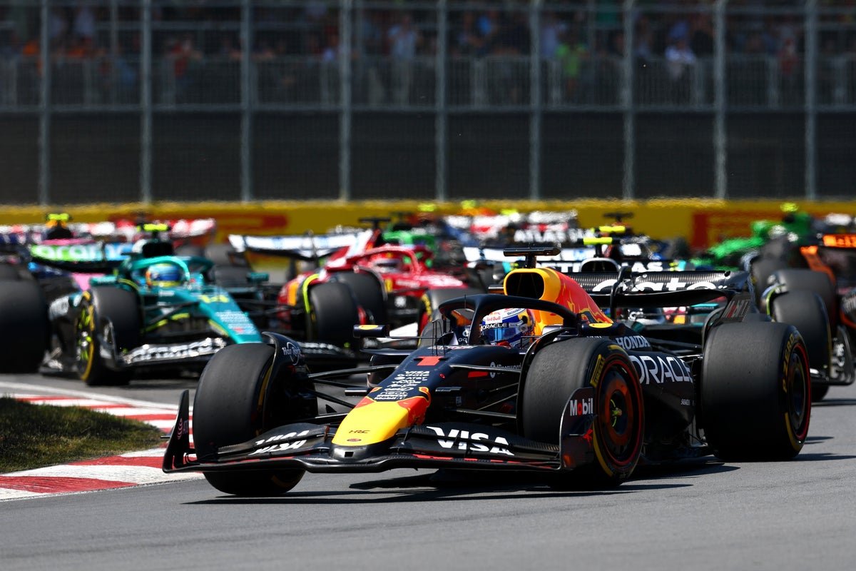 Formula 1 cars racing on the Canadian Grand Prix circuit, with a crowd of spectators in the background. The cars are speeding around a corner, with a mix of colour and movement. The primary keyword, F1 live streams, is reflected in the image, which showcases the excitement and energy of the sport.