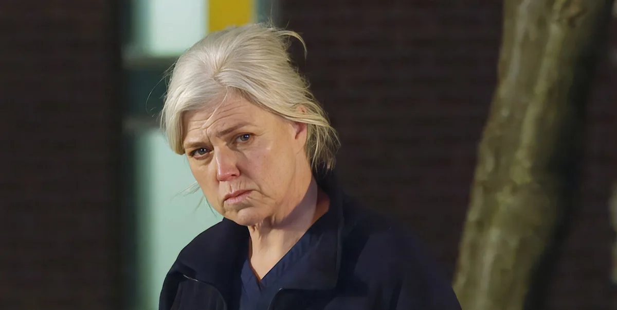 A dramatic scene from Emmerdale featuring Dr Todd, with a focus on the bullying scandal and its consequences, exploring the behaviour and colour of the characters' emotions