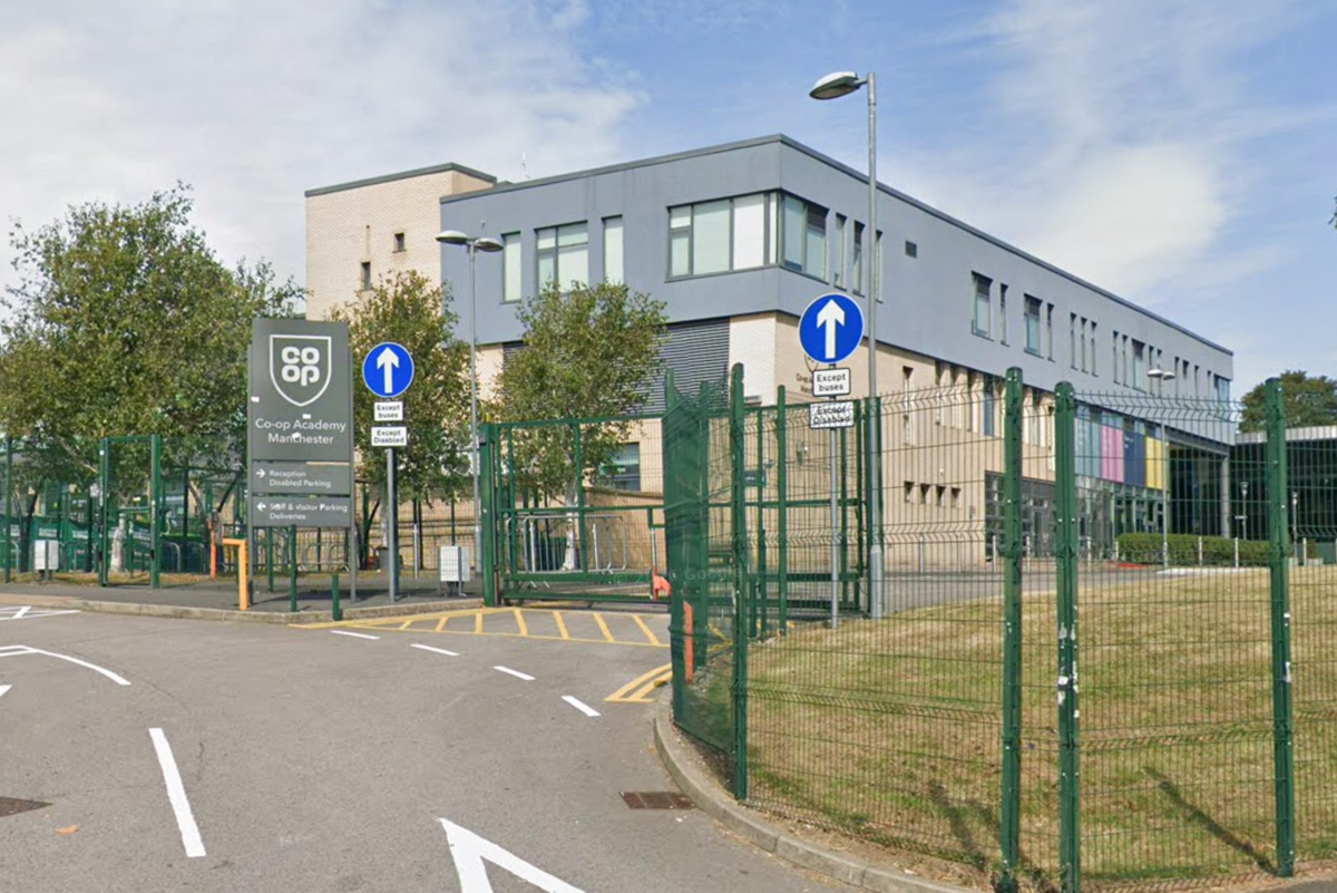 A police car outside a Manchester school, where a stabbing incident occurred, with a focus on school safety and student behaviour