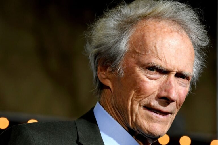 Clint Eastwood on set, directing a scene with a nuanced colour palette and capturing the raw emotion of the moment, showcasing his primary keyword of filmmaking expertise