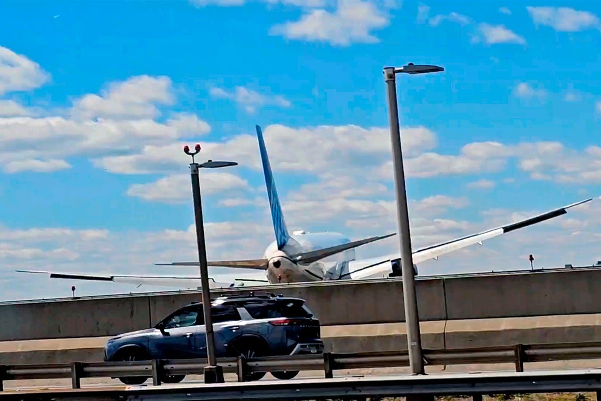 A plane hitting a pole at New Jersey Airport, highlighting the importance of air safety and the need for constant vigilance to prevent such accidents, with the primary keyword being air safety