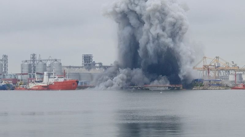 Aerial view of the Romanian port where the drone exploded, with a destroyed drone in the foreground and a ship in the background, highlighting the potential risks and consequences of drone use in military operations