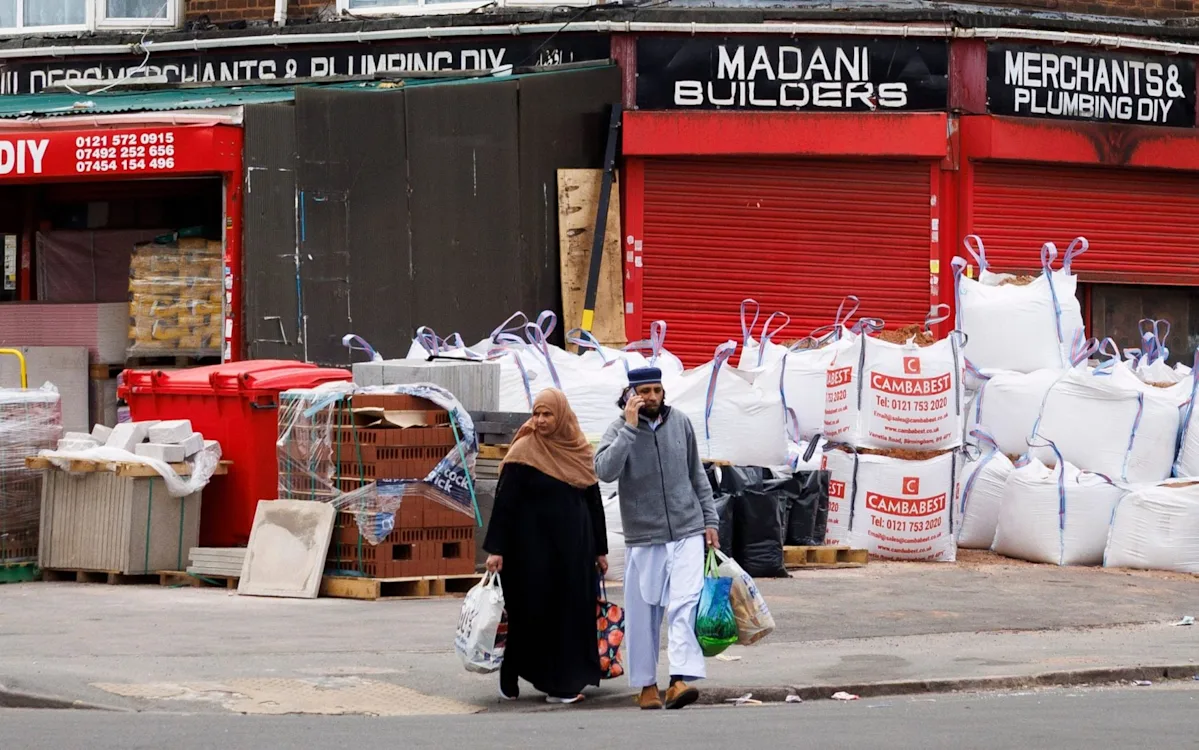A descriptive image of England's second city, with a vibrant and diverse community, and a strong Labour presence, highlighting the party's commitment to education and healthcare, and its desire to maintain its grip on the city