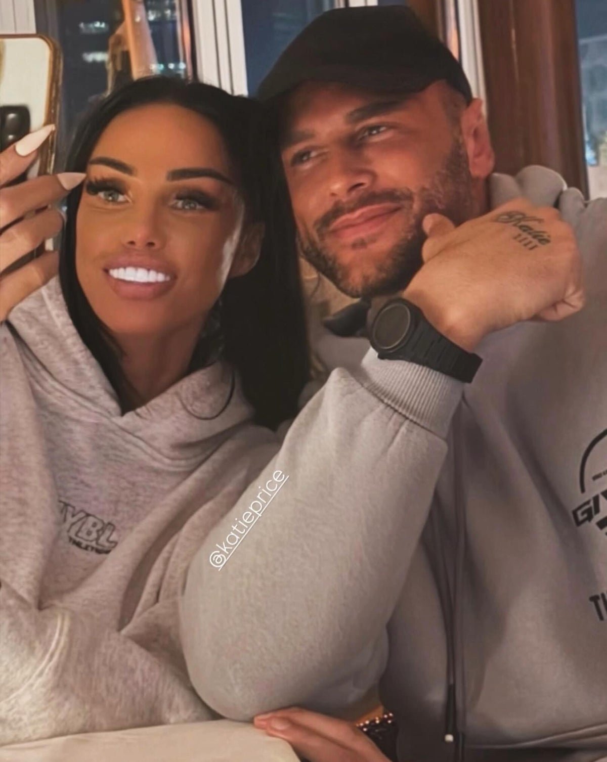Katie Price and Lee Andrews in happier times, with a Dubai backdrop, highlighting the couple's troubled relationship and the primary keyword, Dubai jail